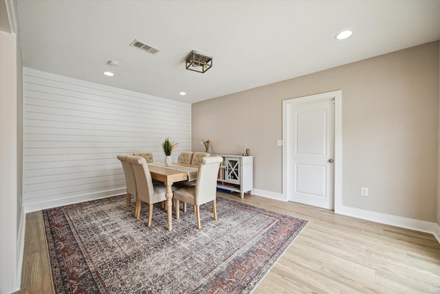 dining room featuring recessed lighting, wood finished floors, visible vents, and baseboards