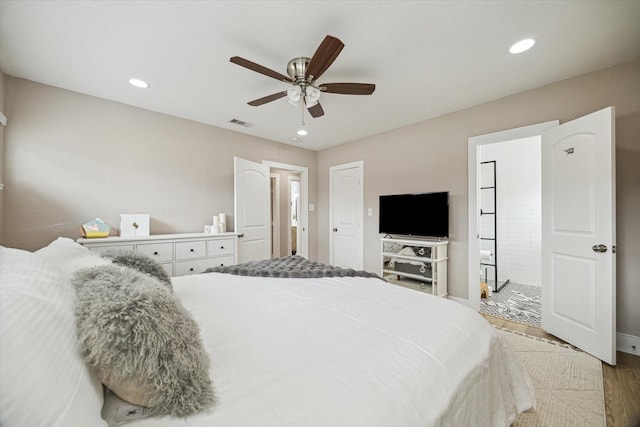 bedroom with visible vents, a ceiling fan, wood finished floors, recessed lighting, and baseboards