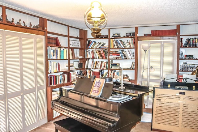 office area with a textured ceiling