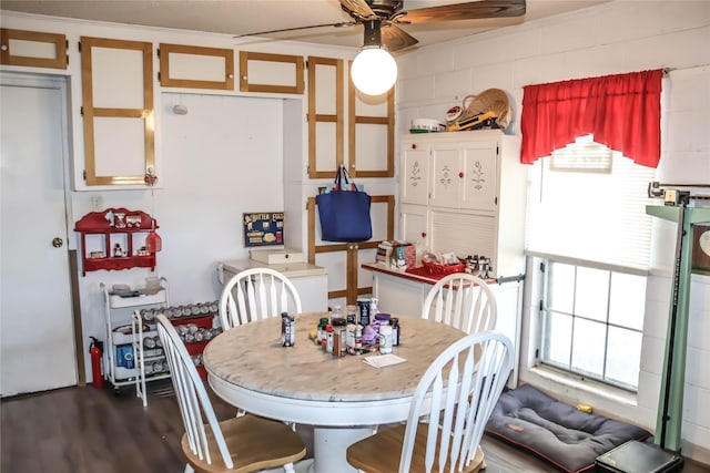 dining room featuring dark wood-type flooring and ceiling fan