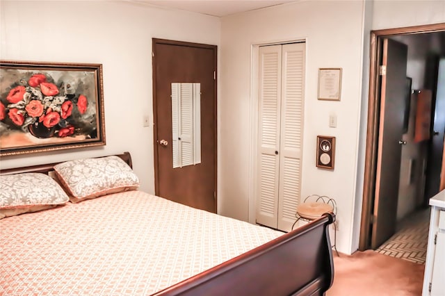 carpeted bedroom with a closet