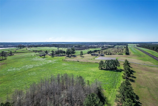 birds eye view of property featuring a rural view