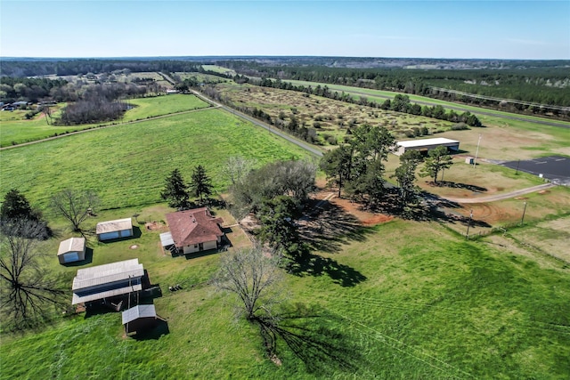 birds eye view of property featuring a rural view