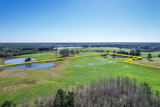 bird's eye view with a rural view and a water view