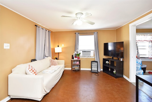 living area with cooling unit, a ceiling fan, baseboards, and wood finished floors