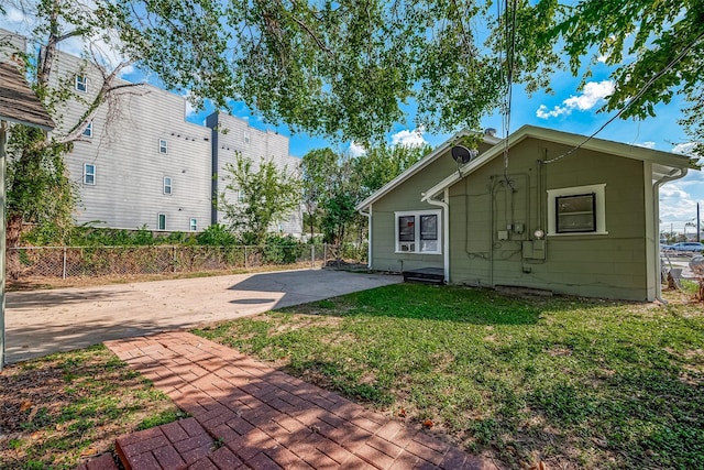 exterior space featuring a patio and fence