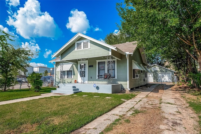 view of front of home featuring covered porch, a front yard, and fence