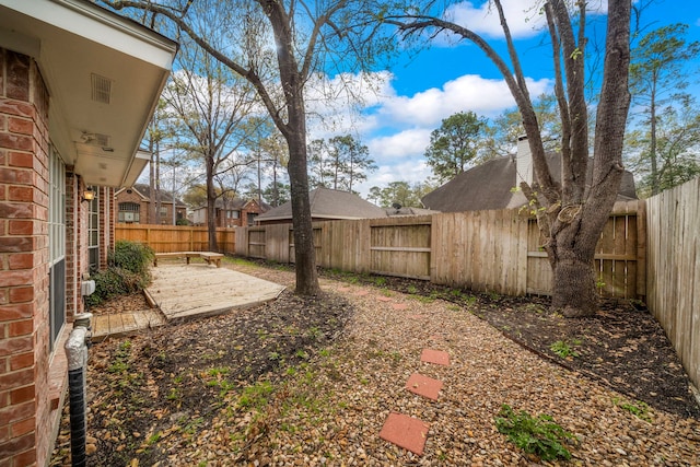 view of yard featuring a patio area and a fenced backyard