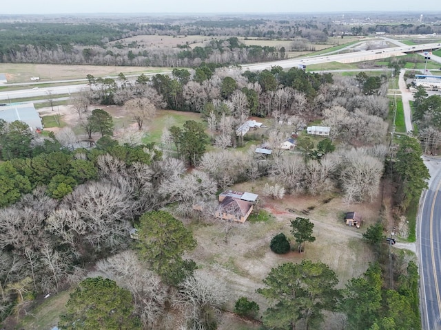 birds eye view of property with a rural view