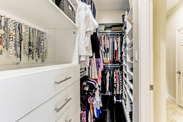 spacious closet with tile patterned flooring