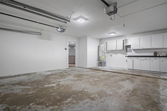 garage featuring gas water heater and a garage door opener