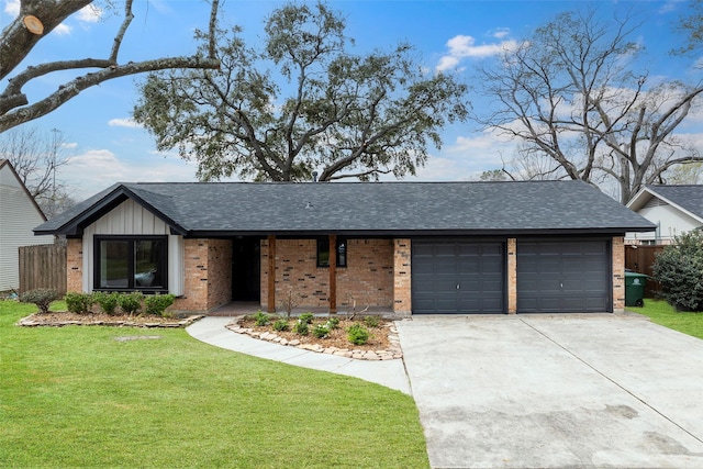 mid-century home with fence, an attached garage, a front lawn, concrete driveway, and board and batten siding