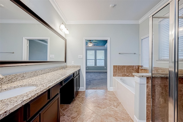 bathroom featuring a sink, a garden tub, and crown molding