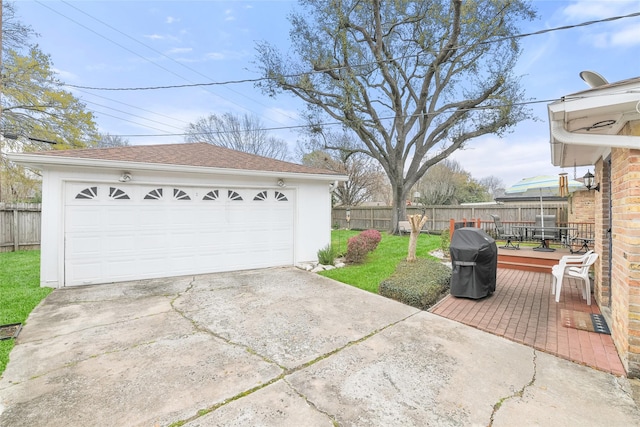 detached garage with fence