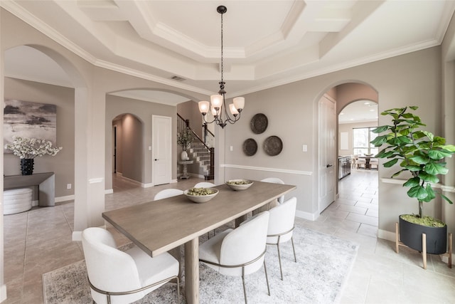 dining room with visible vents, a notable chandelier, arched walkways, light tile patterned flooring, and stairs