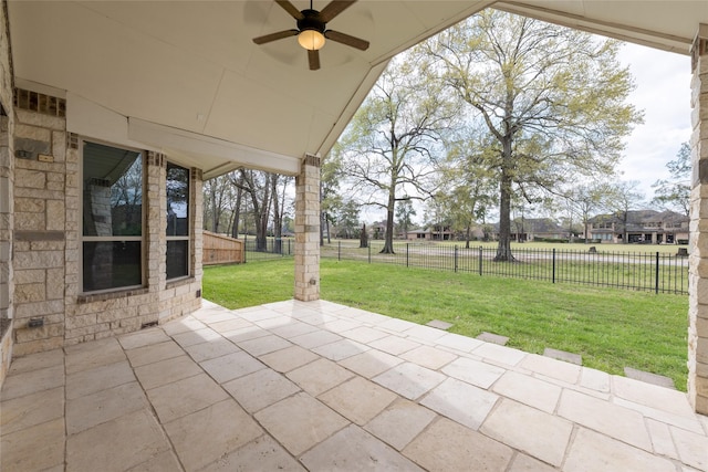 view of patio featuring fence private yard and ceiling fan