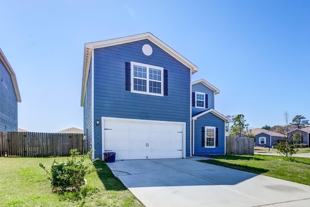 traditional-style home with a front yard, an attached garage, driveway, and fence