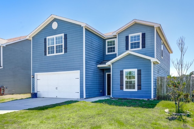 traditional home with a front lawn, fence, a garage, and driveway