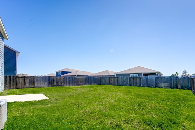 view of yard with a fenced backyard