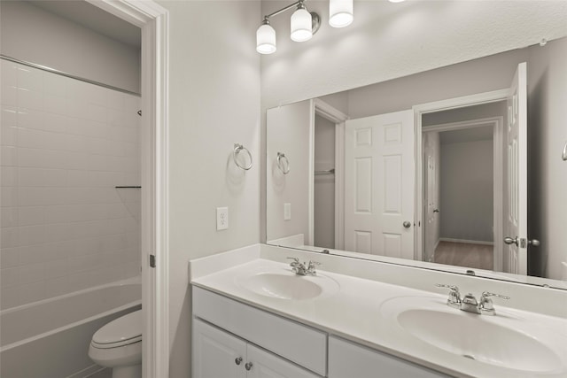 19127 Hazel Firs Ln, Magnolia, TX 77355 - bathroom featuring toilet, double vanity, and bathing tub / shower combination
