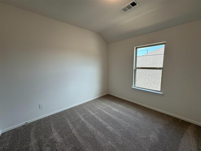 19127 Hazel Firs Ln, Magnolia, TX 77355 - carpeted spare room featuring baseboards and vaulted ceiling