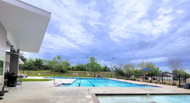 1011 Arrow Hill Rd, Houston, TX 77077 - community pool featuring a patio area and fence