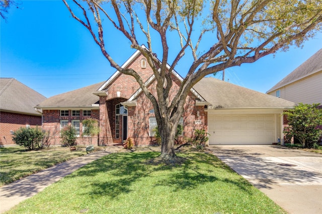 view of front of home with brick siding, a front lawn, concrete driveway, roof with shingles, and a garage