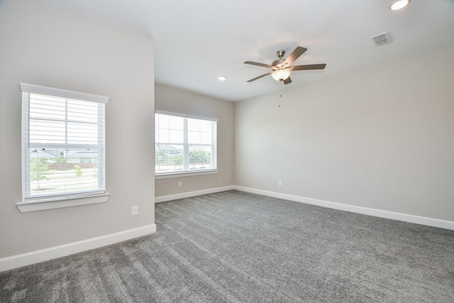 unfurnished room with visible vents, ceiling fan, baseboards, carpet flooring, and recessed lighting