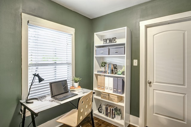 office space with wood finished floors