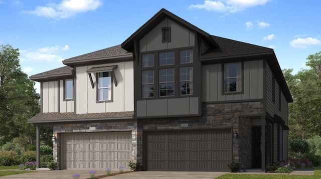 view of front facade with driveway, a garage, board and batten siding, and stone siding