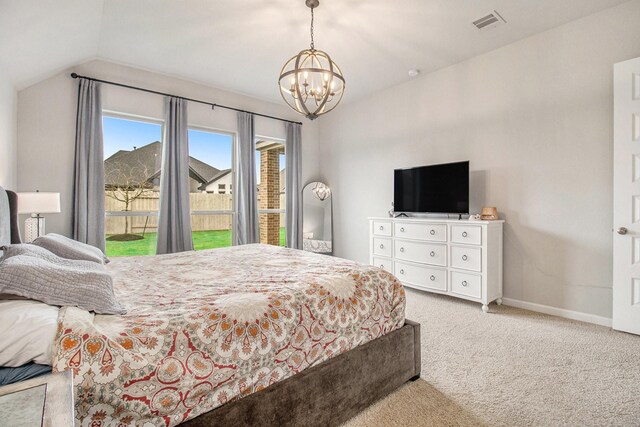 bedroom featuring baseboards, carpet floors, access to exterior, vaulted ceiling, and a notable chandelier