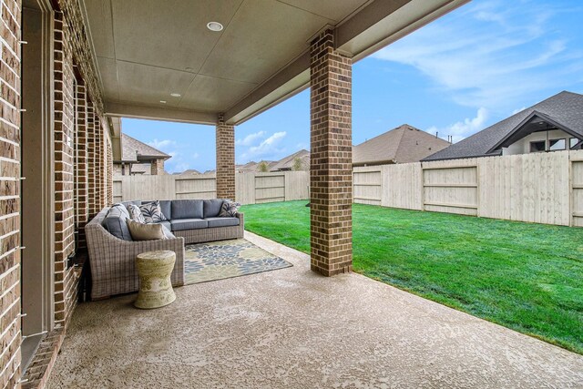 view of patio / terrace featuring an outdoor hangout area and a fenced backyard