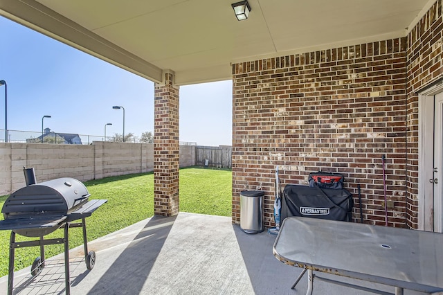 view of patio / terrace featuring grilling area and a fenced backyard