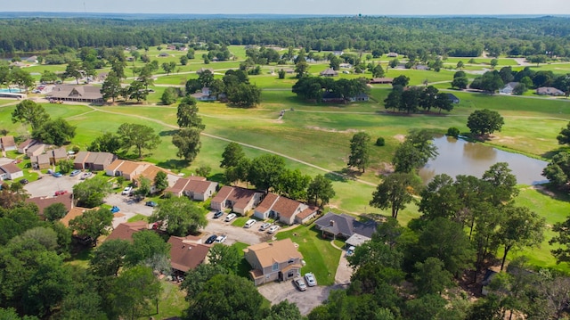 bird's eye view with a residential view, a water view, and view of golf course