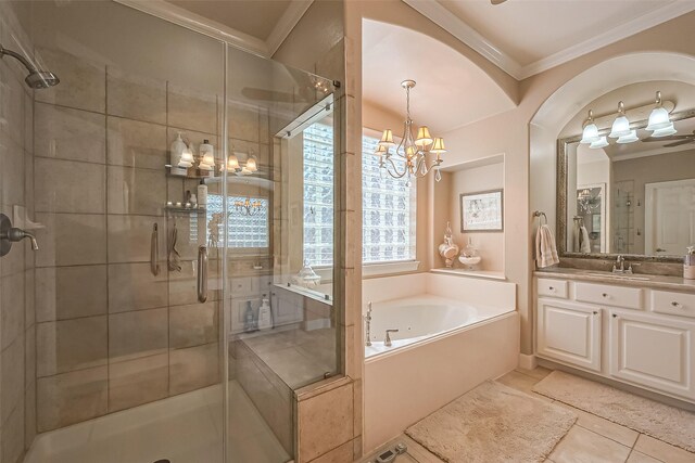 full bath with vanity, a stall shower, tile patterned flooring, crown molding, and a bath