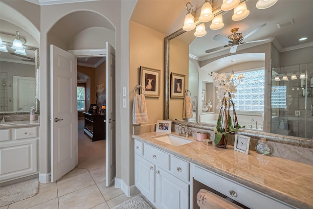 bathroom with visible vents, ornamental molding, a ceiling fan, a shower stall, and tile patterned flooring