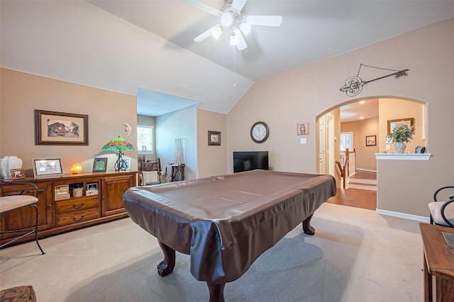 playroom with pool table, carpet, vaulted ceiling, arched walkways, and a ceiling fan