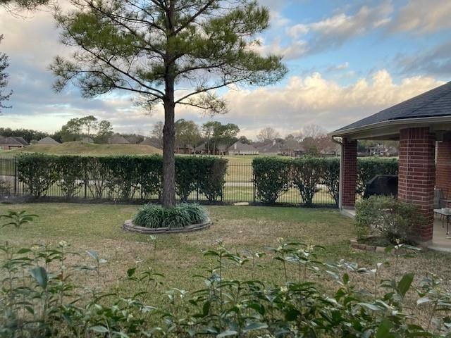 view of yard with fence