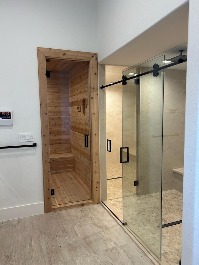 bathroom with a shower stall