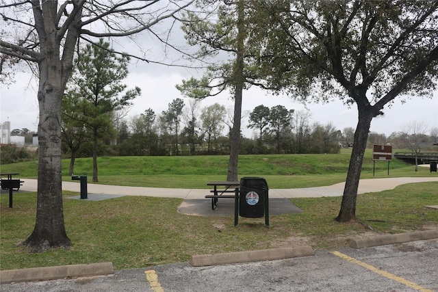14902 Woodford St, Channelview, TX 77530 - view of home's community featuring a yard and uncovered parking