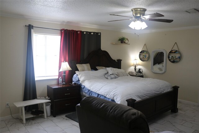 bedroom featuring baseboards, marble finish floor, and a textured ceiling