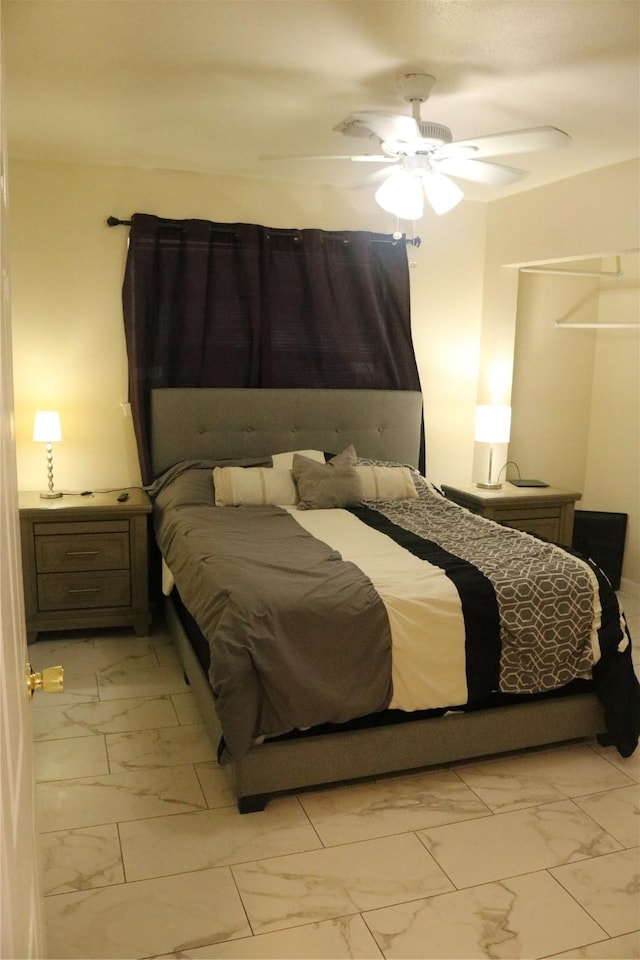 14902 Woodford St, Channelview, TX 77530 - bedroom featuring light marble finish floors and ceiling fan