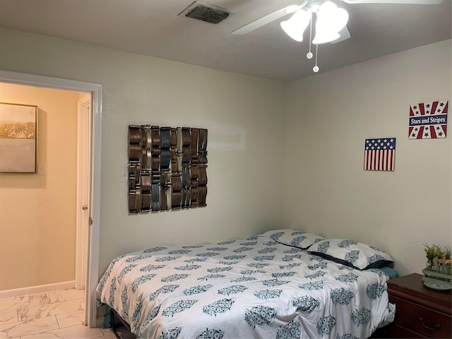 14902 Woodford St, Channelview, TX 77530 - bedroom featuring marble finish floors and a ceiling fan