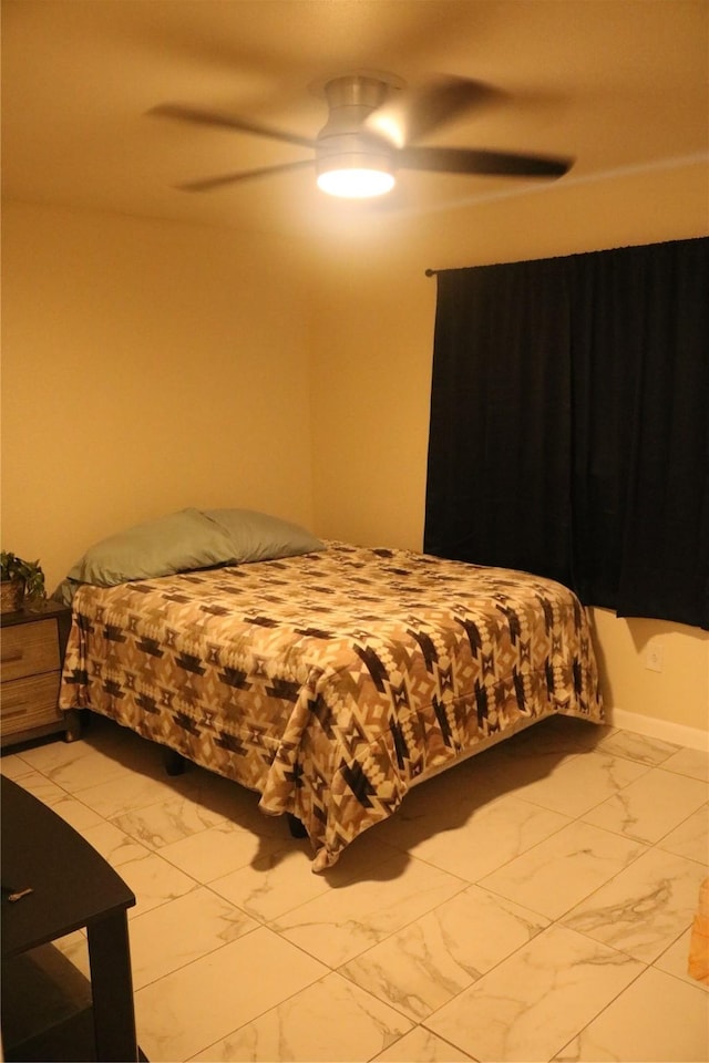 14902 Woodford St, Channelview, TX 77530 - bedroom with light marble finish flooring and ceiling fan