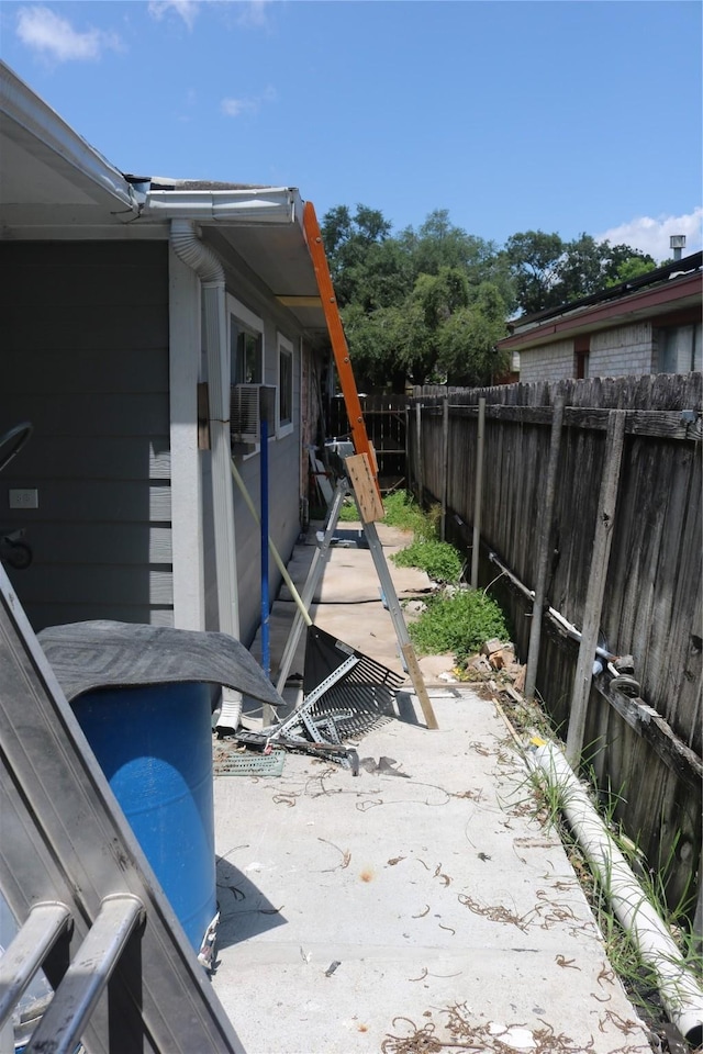 14902 Woodford St, Channelview, TX 77530 - view of patio / terrace featuring fence