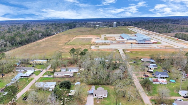 aerial view with a wooded view