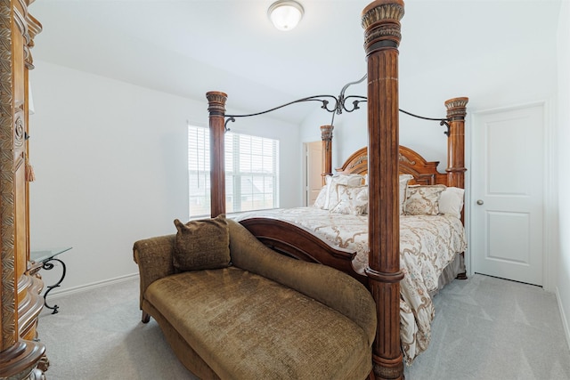 bedroom featuring baseboards and carpet floors