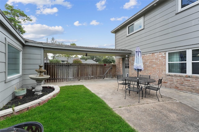 view of yard featuring a patio and fence