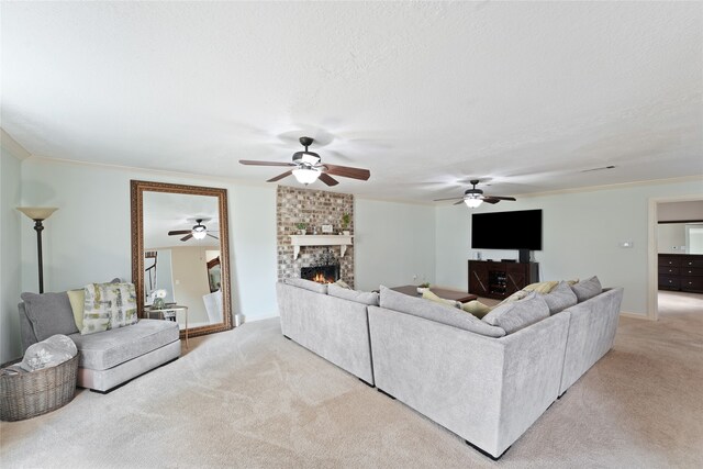 living area featuring light colored carpet, a brick fireplace, ornamental molding, and a textured ceiling