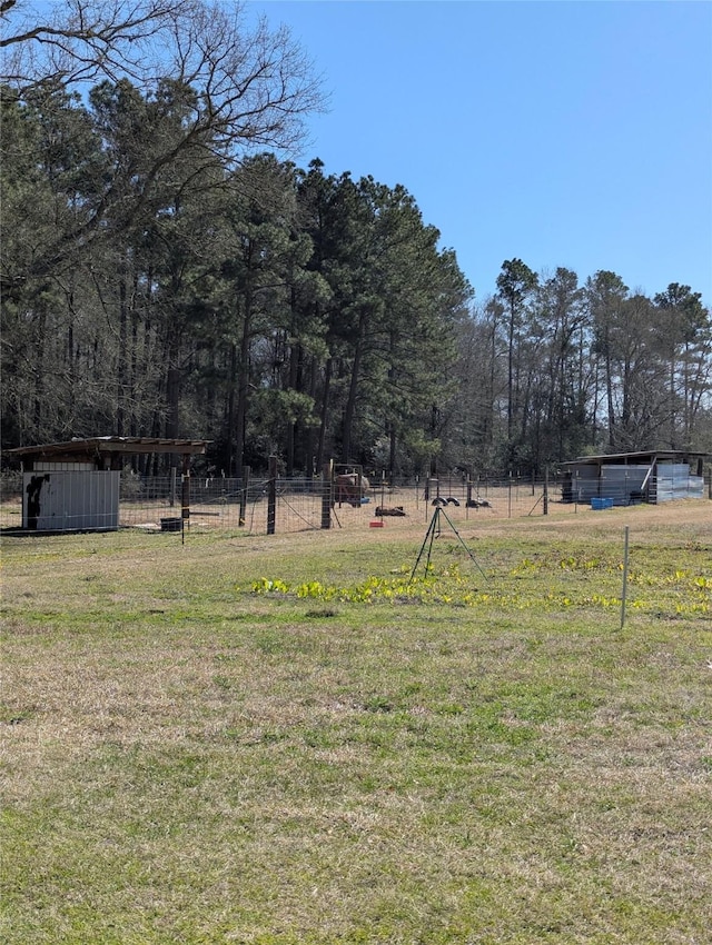 view of yard with fence